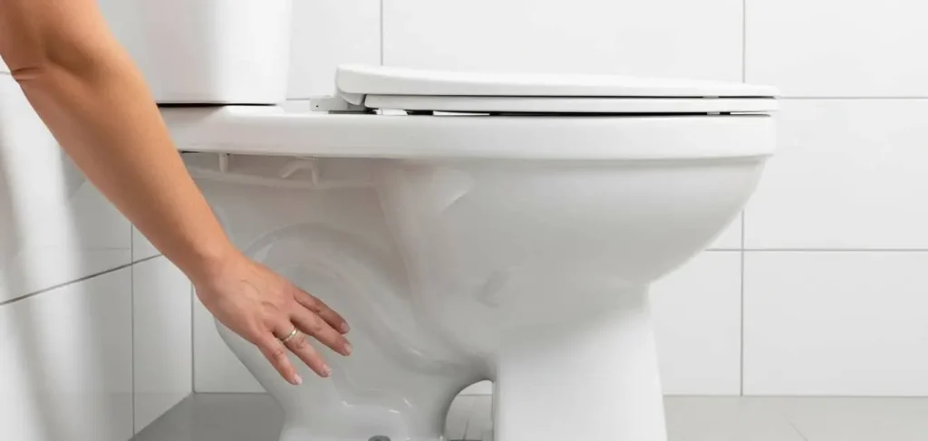 Wobbly toilet rocking on bathroom floor showing loose connection